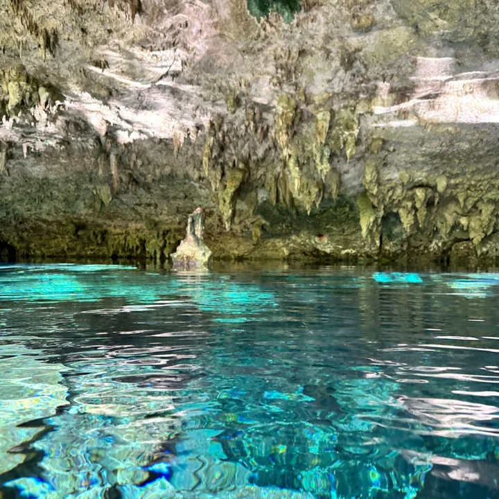 Clear turquoise water inside a Riviera Maya cave cenote